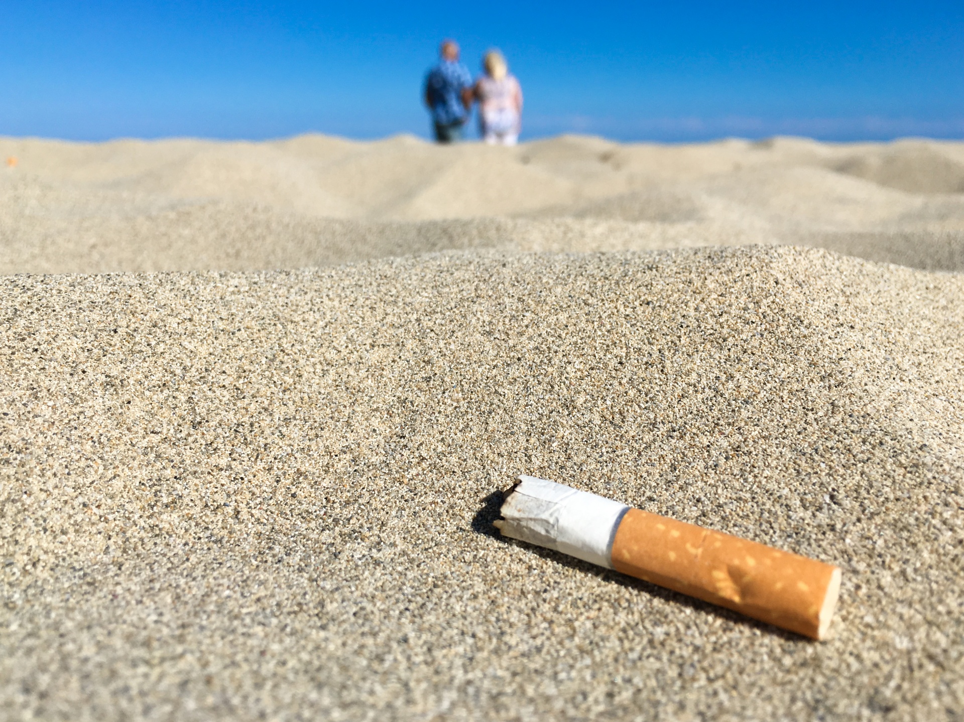 Cigarette Butt On The Beach