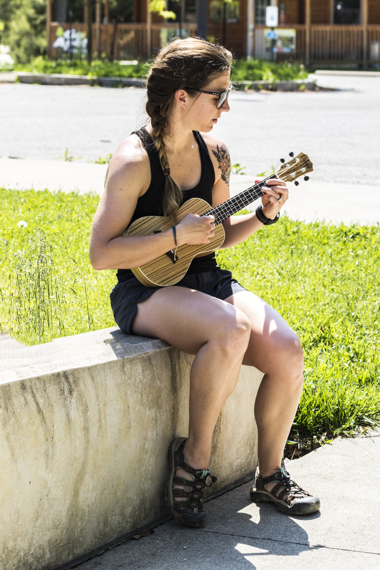 Girl playing uke.