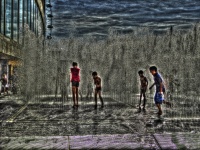Children Playing In Fountain