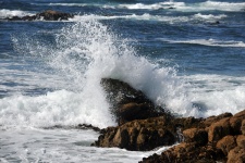 Ocean Wave Crashing On Rock