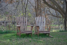 Two Abandoned Wooden Chairs