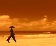Woman Silhouette Walking Beach