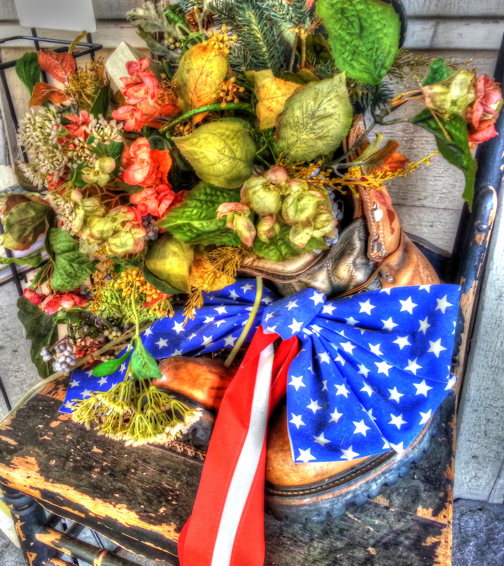 floral arrangement with stars and stripes ribbon