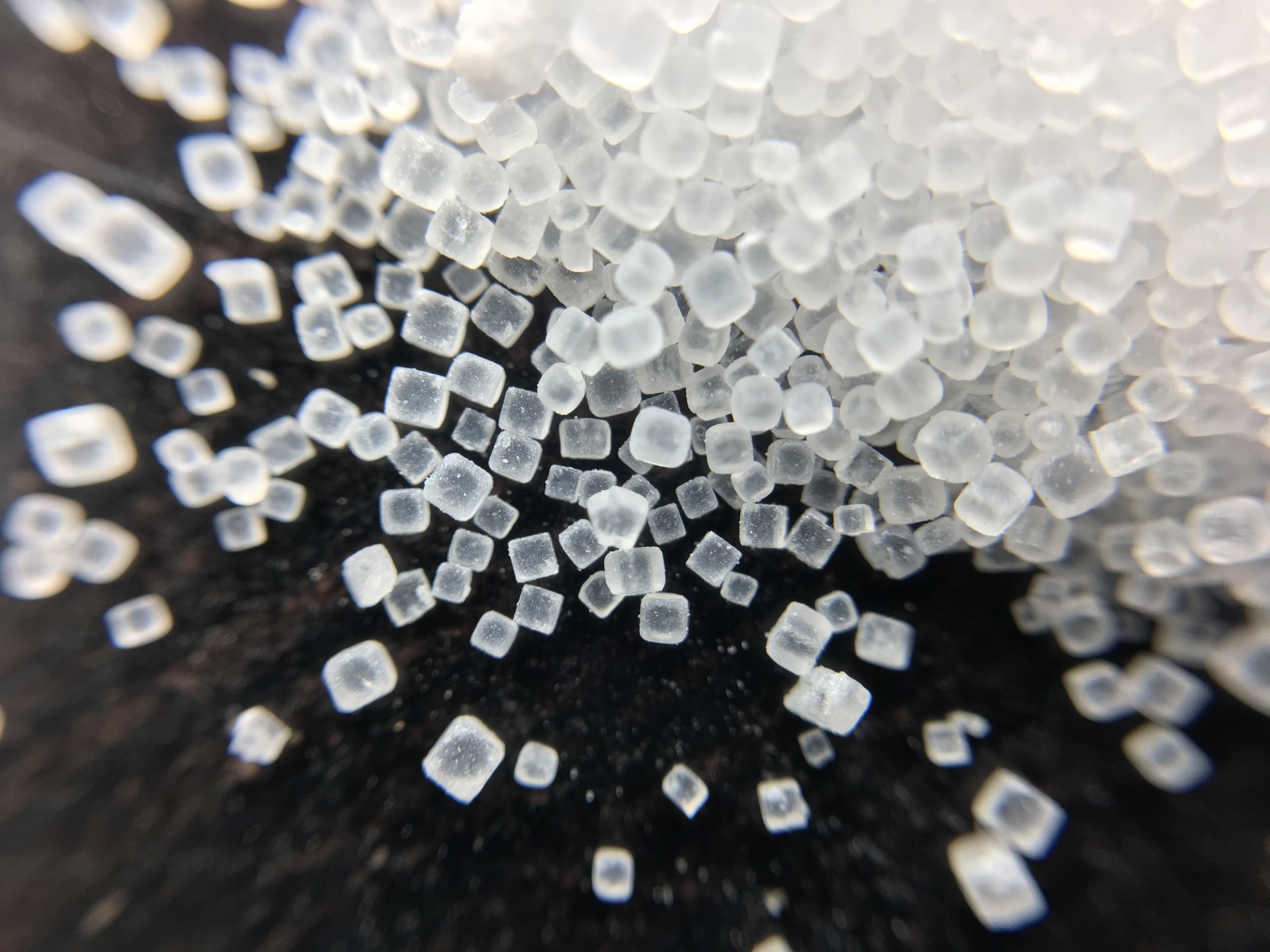 Iodized salt forms crystals that are perfect cubes. Very cool to see at magnification