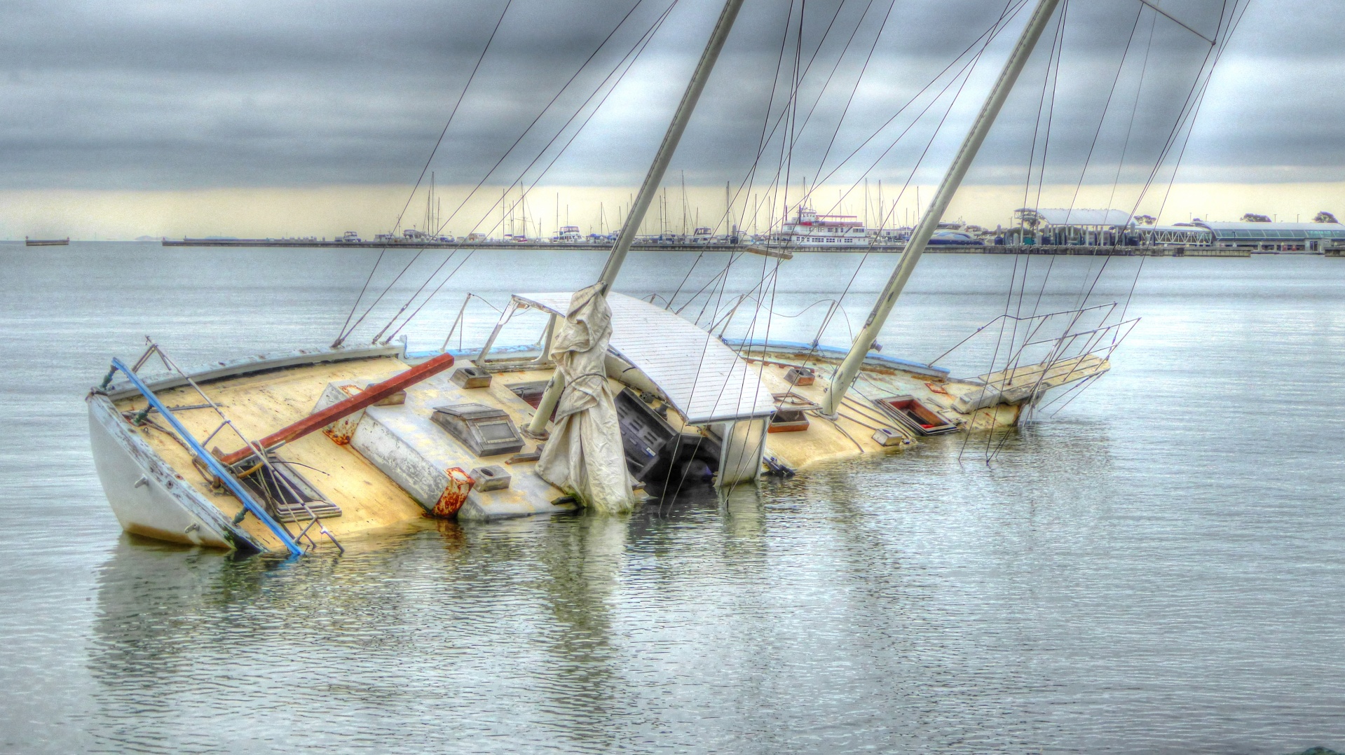 artistic touch applied to a photo of a sunken sail boat