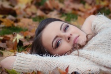 Beautiful Girl Lying In The Leaves