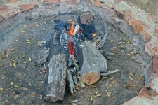 Logs Burning In Fire Pit