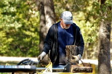 Man Using Log Splitter
