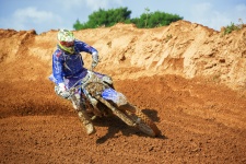 Motocross Biker Turn In Mud