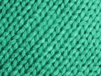 Turquoise Knitted Wool Background