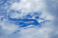 Wispy Clouds With Blue Sky