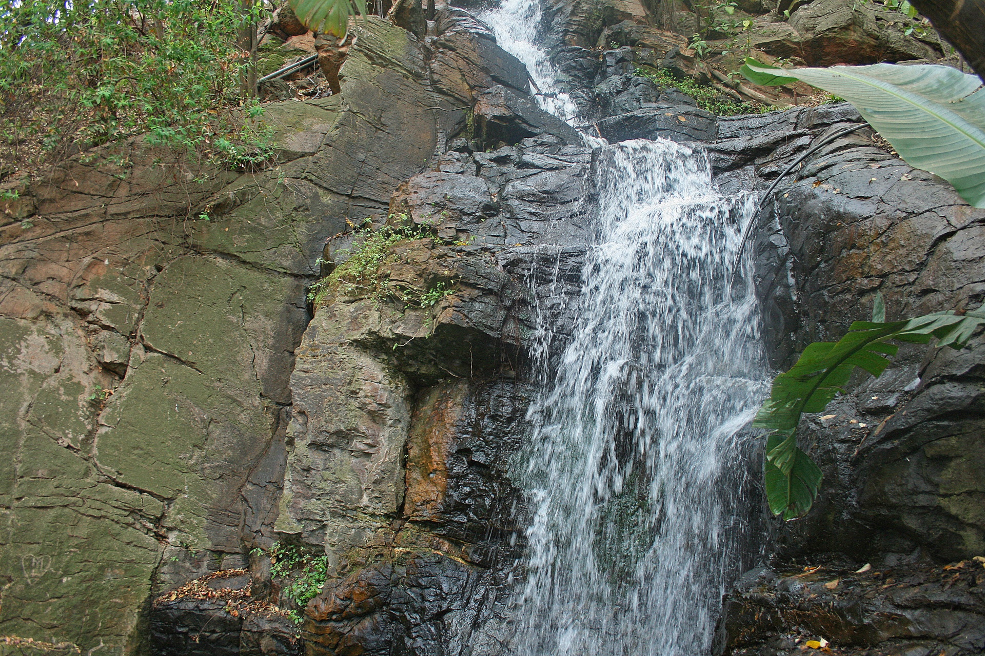 A Waterfall Cascading Over Rocks