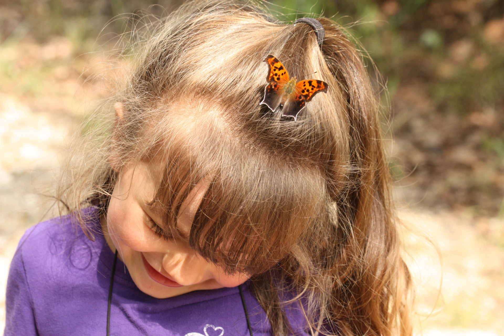 Butterfly On Child's Head