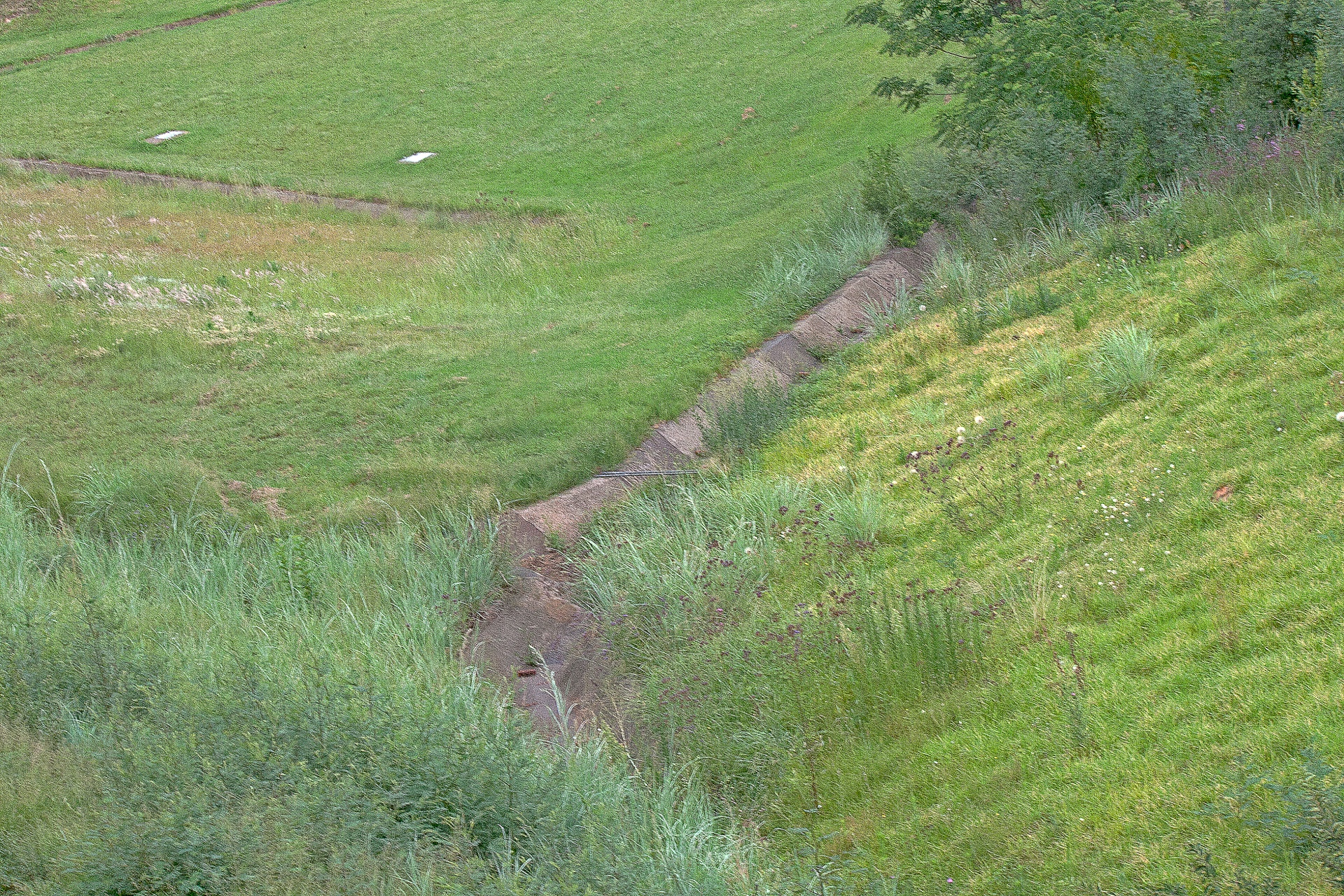 Downsloping Ditch