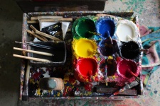 Artist's Paint Pots And Brushes