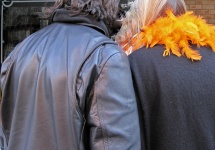 Black Leather Jacket And Orange Boa