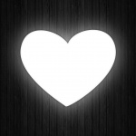 Heart On Wooden Background