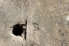 Hole In Concrete Wall