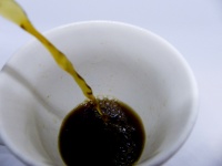 Pouring Coffee In A White Cup