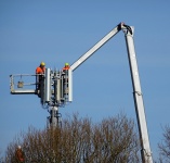 Technical Workers On Cherry Picker