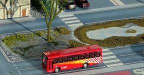 Toy Bus On The Road
