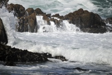 Waves Crashing Over Rocks