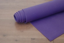 Yoga Mat On Wooden Floor