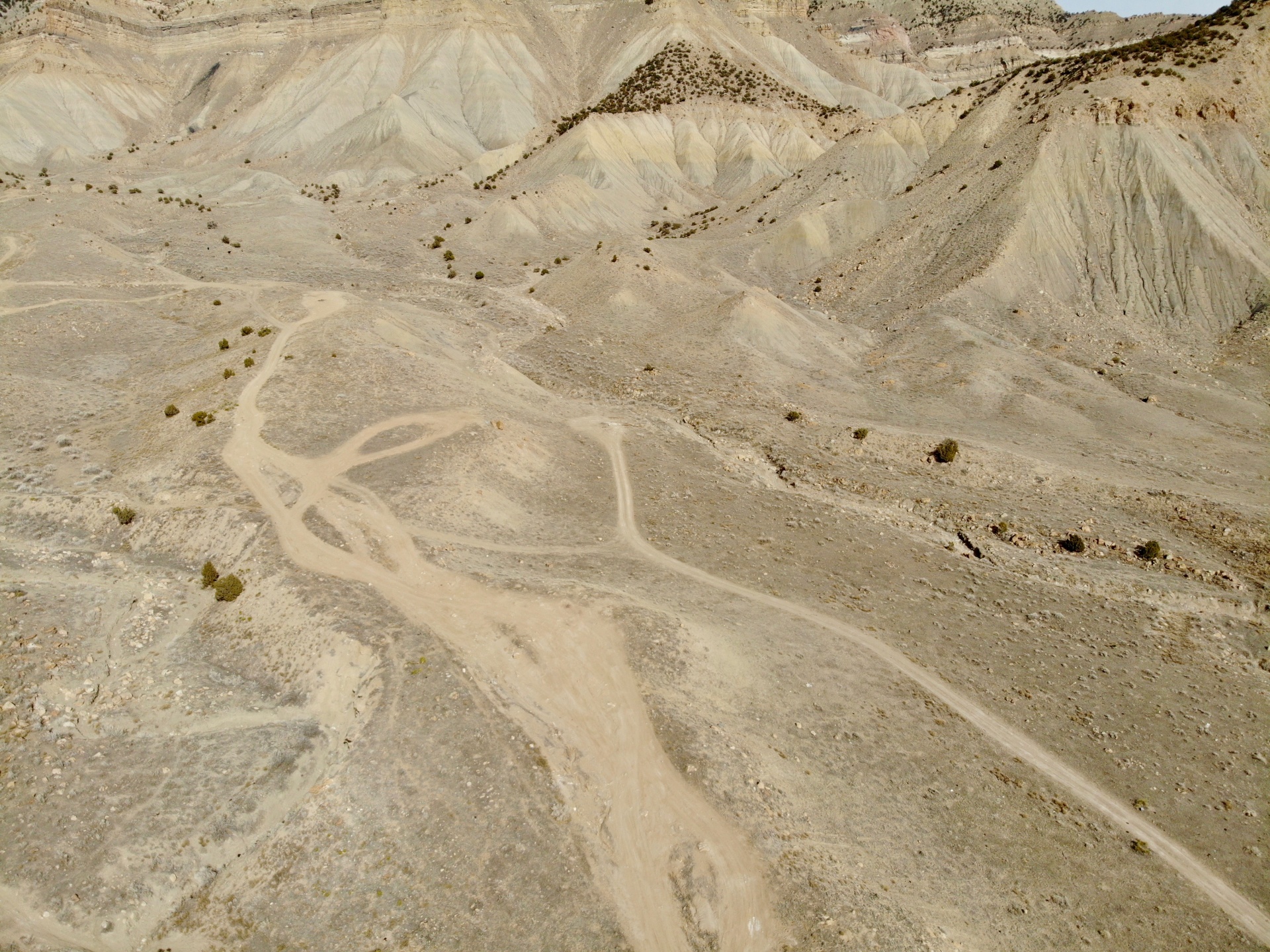 Several dirt roads converge near a pistol range in the high desert of Western Colorado.