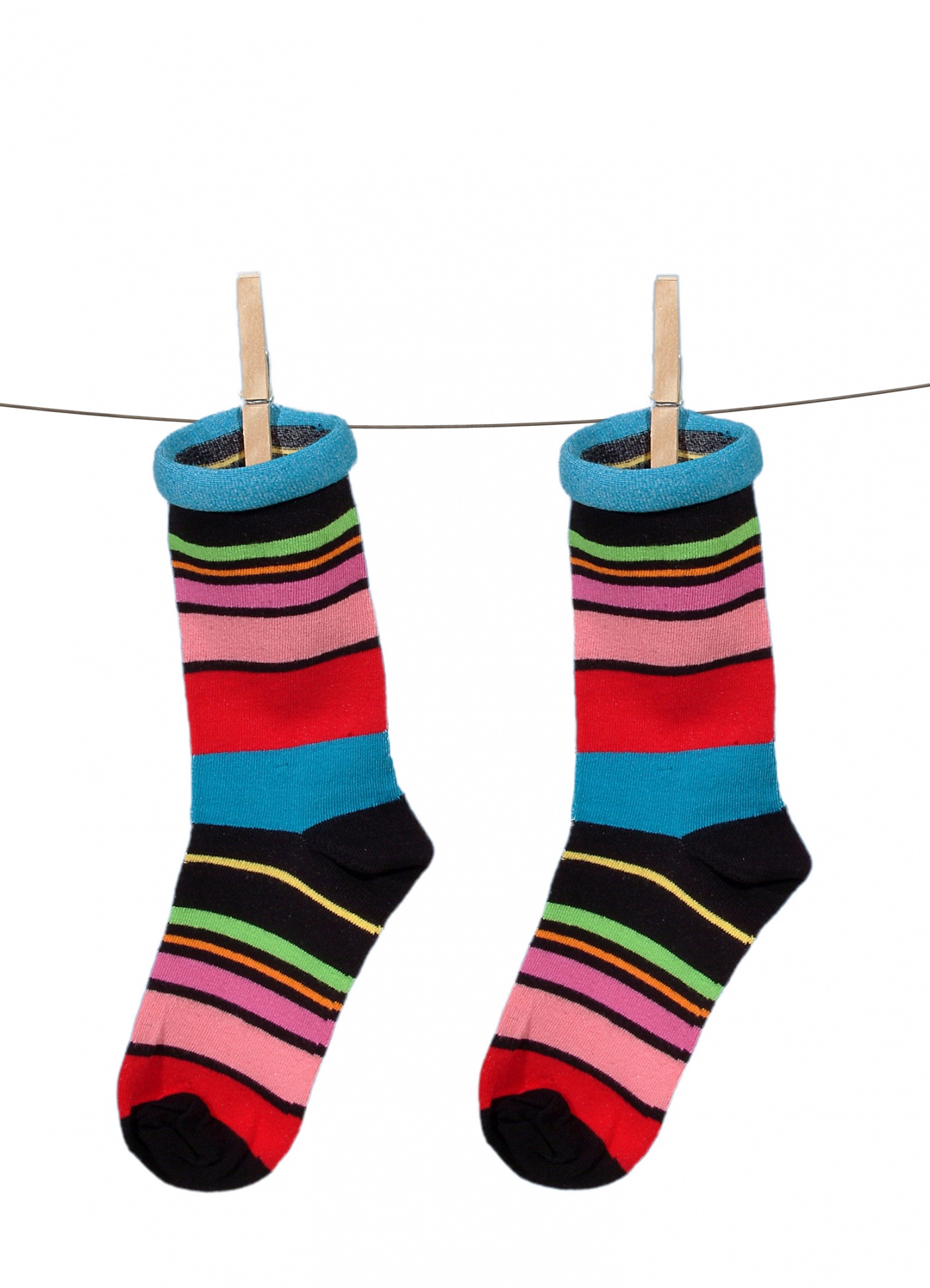 Striped colorful socks on line isolated on white background