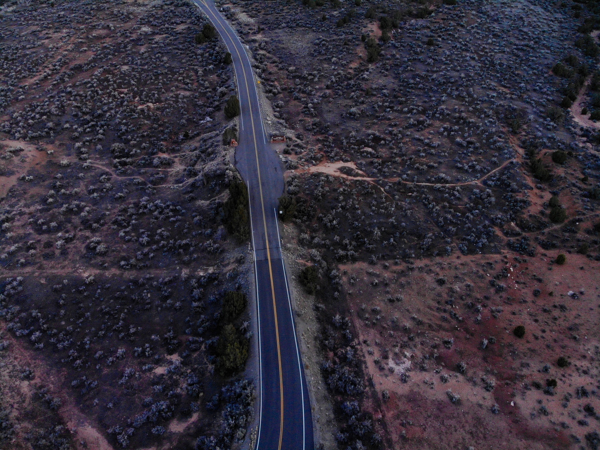Just a lonely road running through a rural part of Western Colorado. Photographed by a Mavic Air drone.