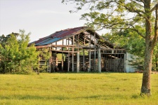 Old Abandoned Barn In The Country