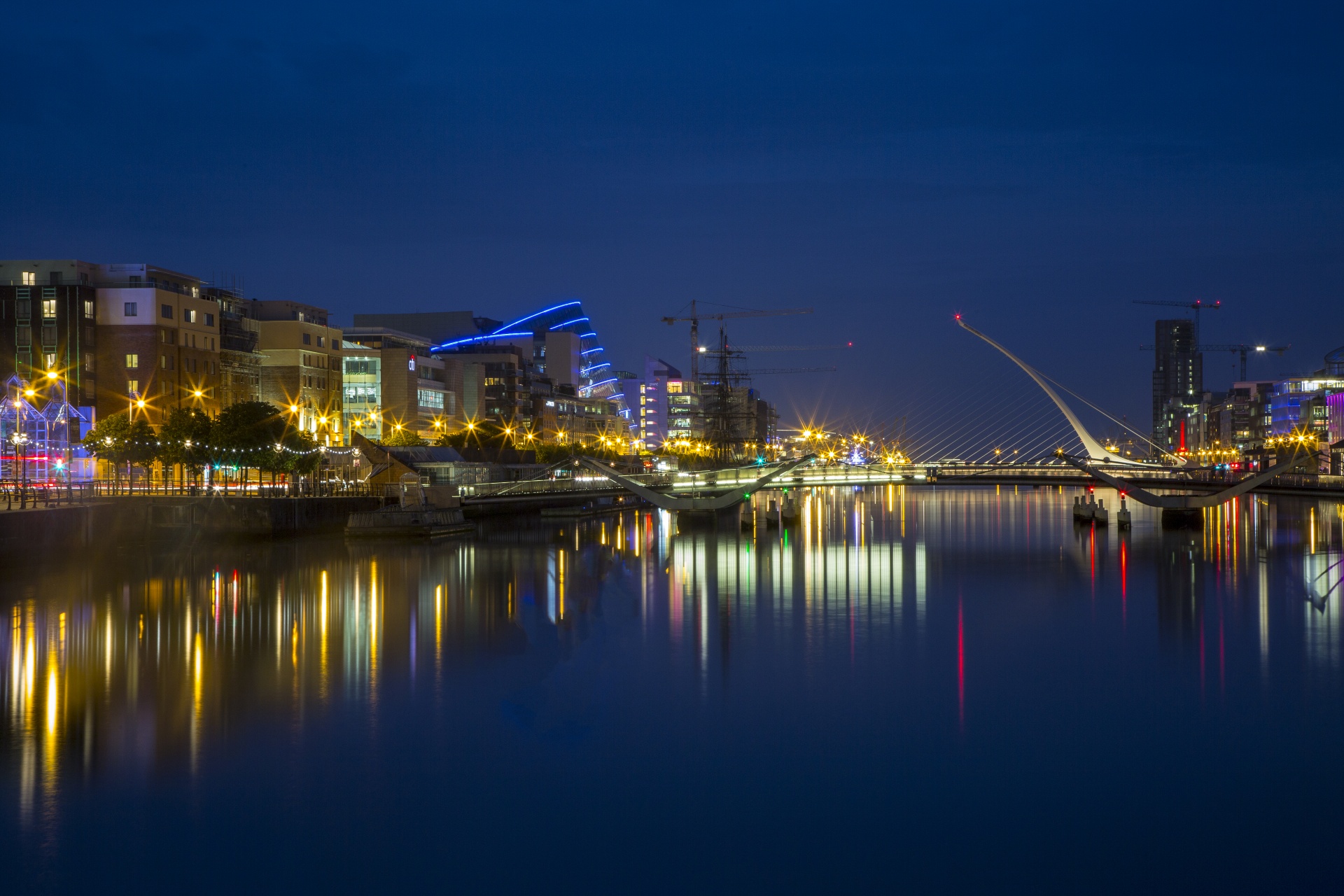 Samuel Beckett Bridge is a cable-stayed bridge in Dublin that joins Sir John Rogerson's Quay on the south side of the River Liffey to Guild Street and North Wall Quay in the Docklands area