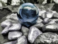 Blue Sphere On Rocks Background