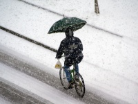 Cyclist In The Storm