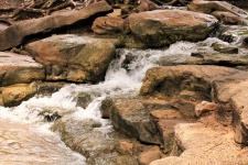 Creek Flowing Over Rocks