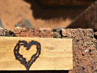 Heart Shape On Wood With Bricks