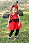 Little Girl Dressed As Lady Bug