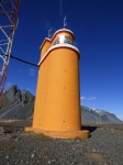 Orange Lighthouse In Iceland