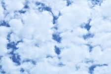 Puffy White Clouds Background