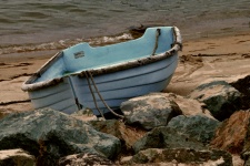 Rowboat On Ocean Shore