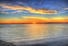 Sunrise Above The Lake Horizon