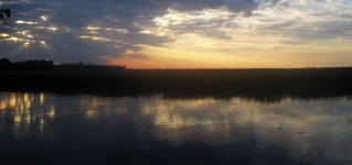 View Of Sunset Over River