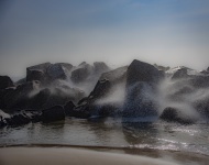 Waves Crashing Over Rocks