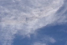 Wispy Clouds In A Blue Sky