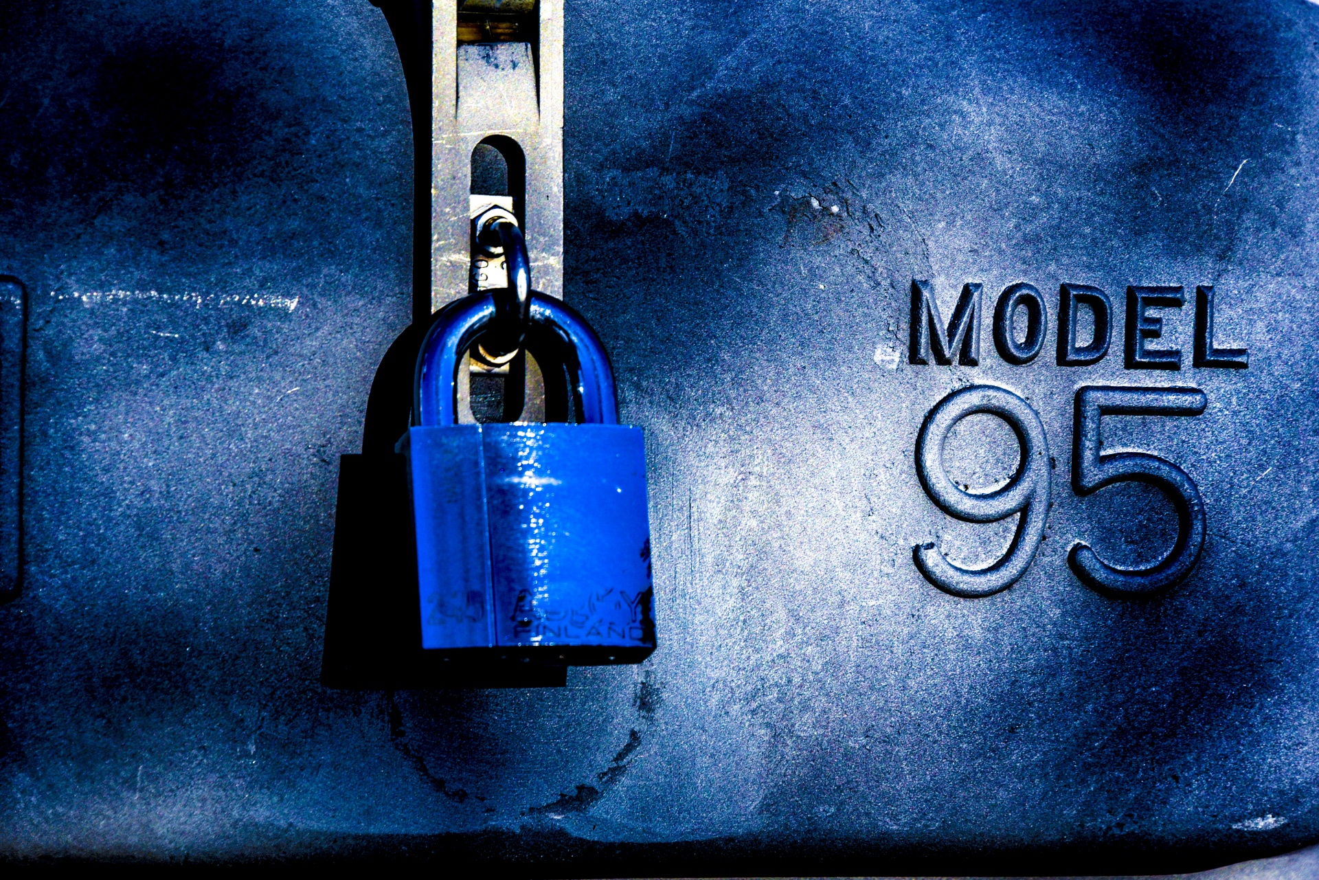 Blue padlock on a blue door free for download and use on commerical or personal projects