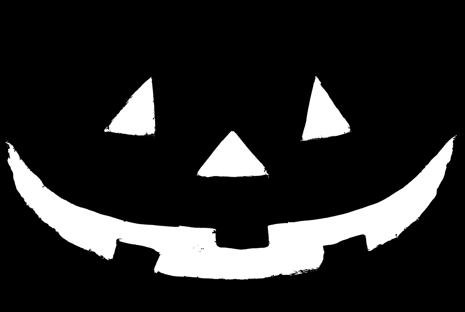 black and white face of a smiling pumpkin for Halloween