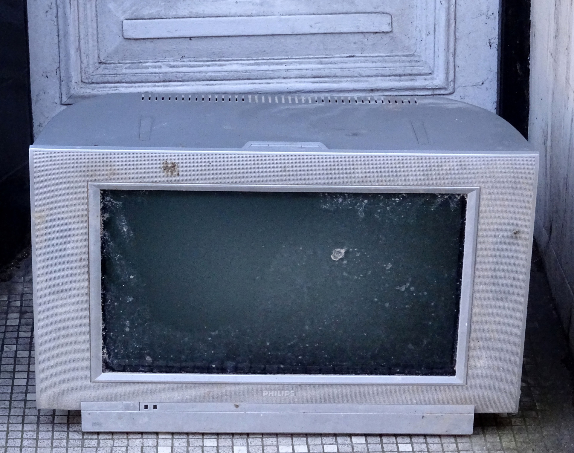Old TV Dumped In Shop Doorway