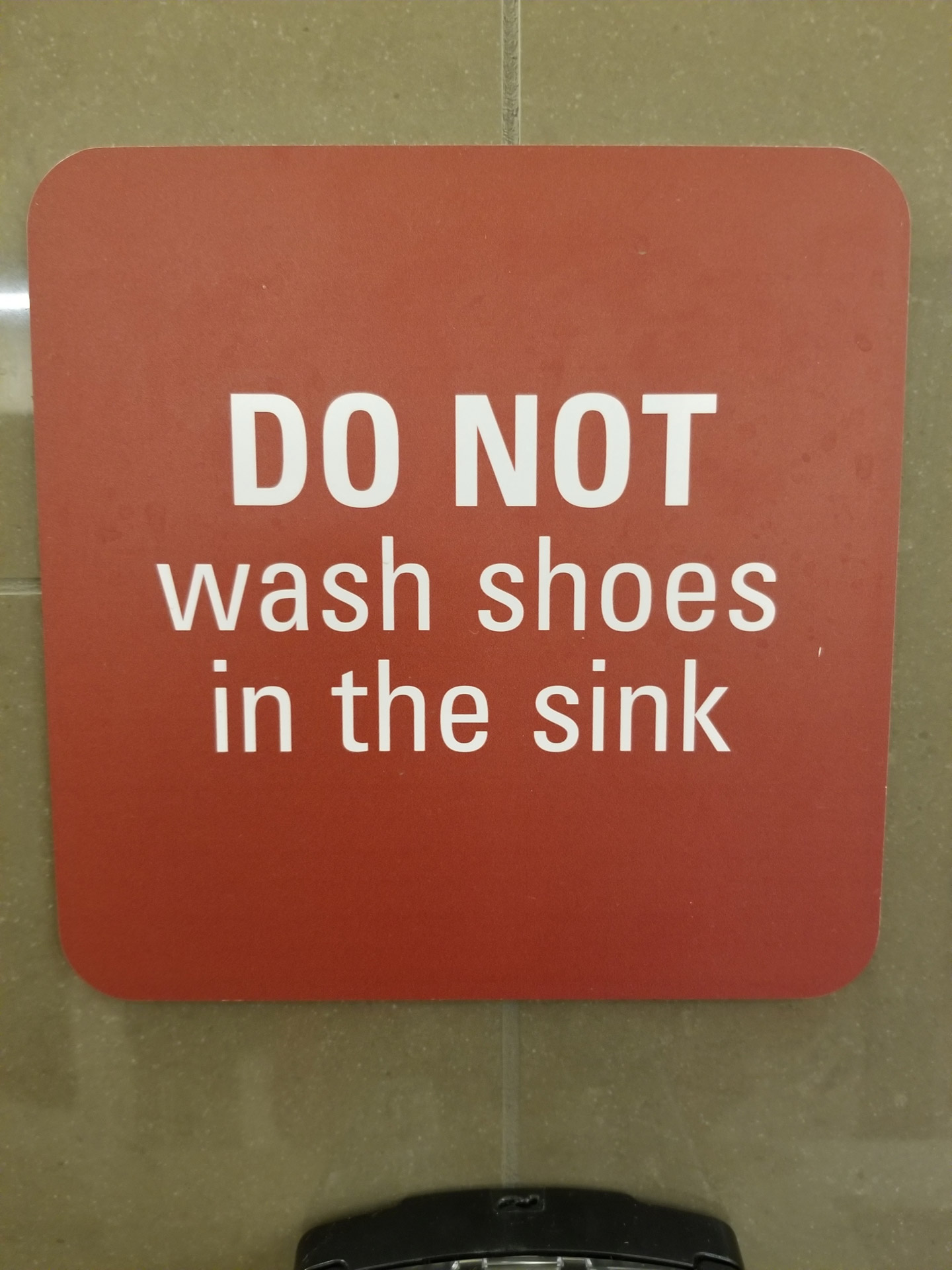 Sign In The Public Washroom