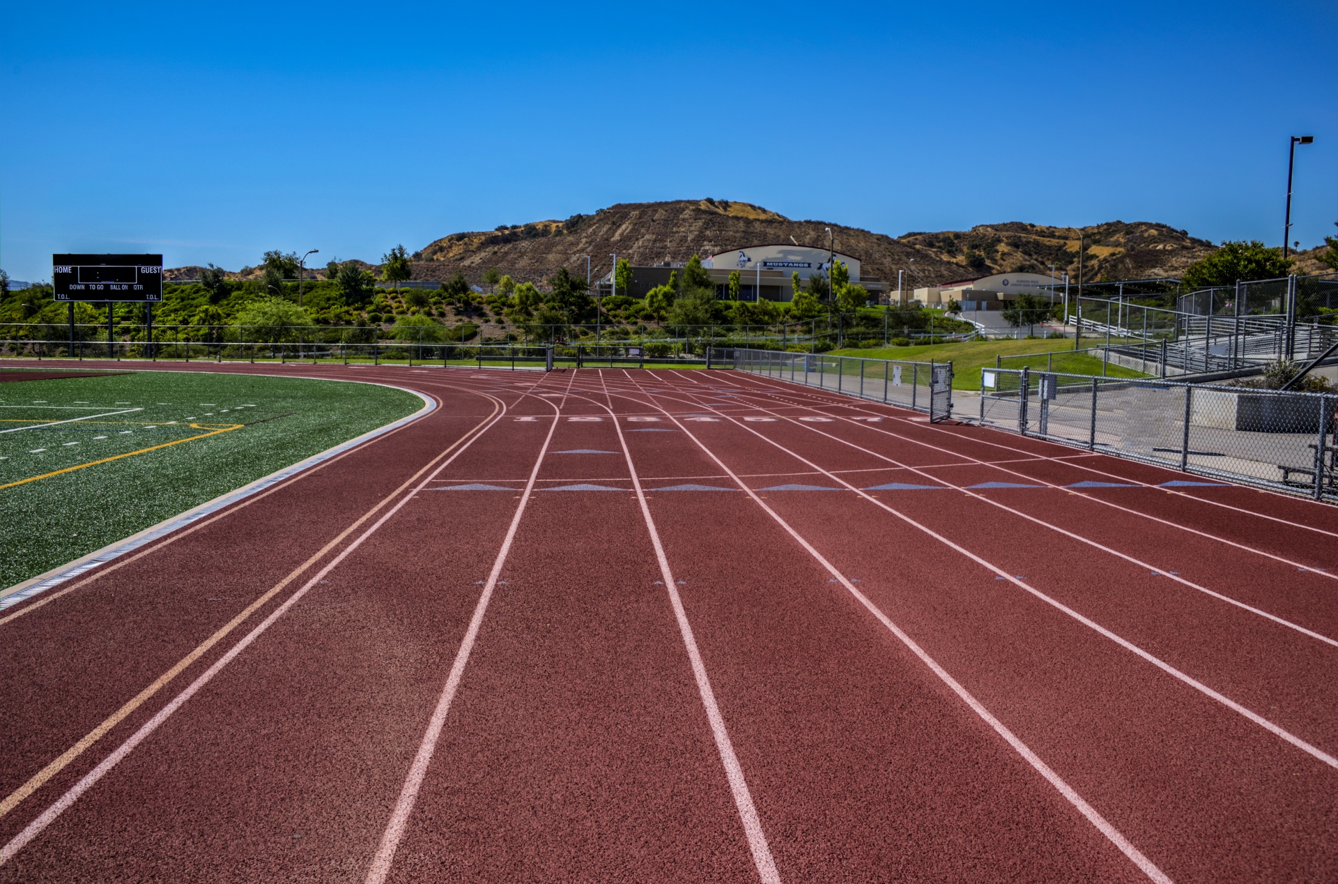 Track for running in Track and field background image free for download and use on commerical or personal projects