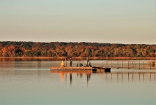 Boys Fishing On Dock In Fall